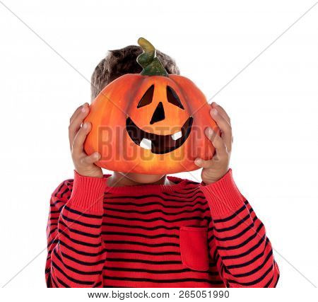Happy latin boy holding a big pumpkin isolated on a white background