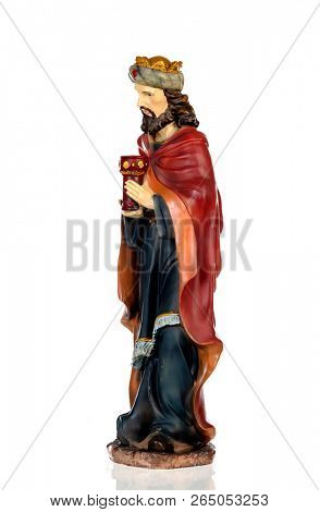 Gaspar, one of the three wise men. Ceramic figure isolated on white background