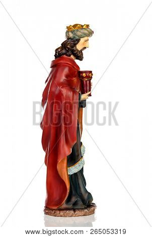 Gaspar, one of the three wise men. Ceramic figure isolated on white background