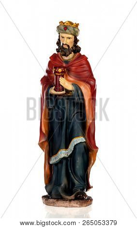 Gaspar, one of the three wise men. Ceramic figure isolated on white background