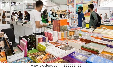 Seller Man And Visitors At Eskisehir Book Fair In Turkey