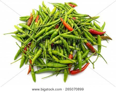 Stack Of Hot Chili Pepper Or Small Chili Padi On White Background.