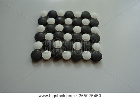 Vitamin K (white) And Iron (black) In Check Pattern