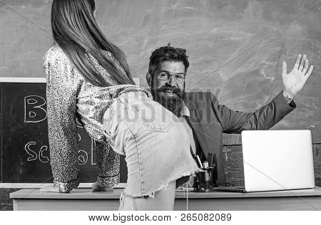 Teacher Or School Principal Punishes Slapping Buttocks Sexy Girl Student. Student In Mini Skirt With