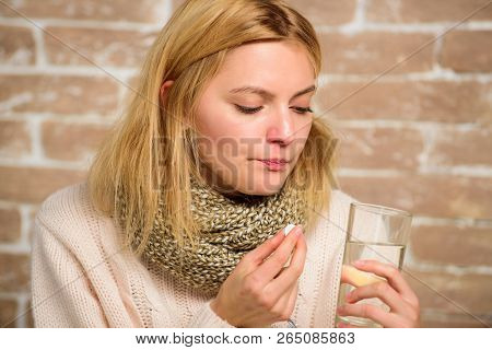 Headache And Fever Remedies. Woman Tousled Hair Scarf Hold Glass Water And Tablets Blister. Girl Fee