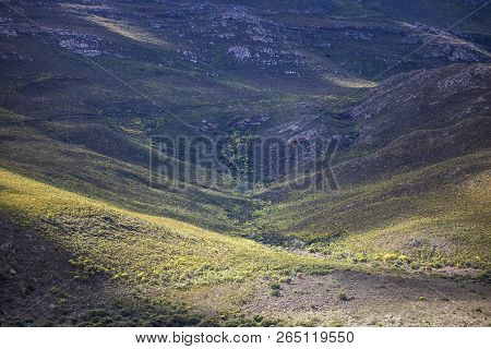 Shadows Of Clouds Over A Massive Mountain Range - Somerset West, Western Cape, South Africa.