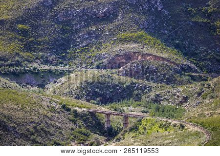 Railway Bridge Through A Massive Mountain Range - Somerset West, Western Cape, South Africa.