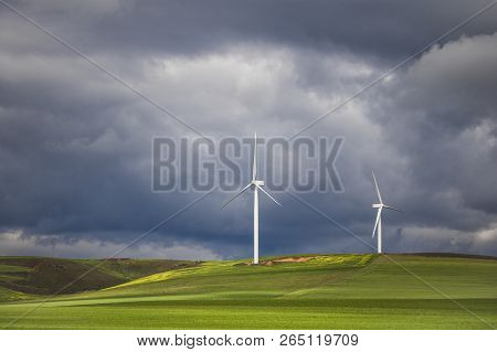 Dramatic Thunderstorm Over Wind Turbines In Green Fields - Caledon, Western Cape, South Africa.