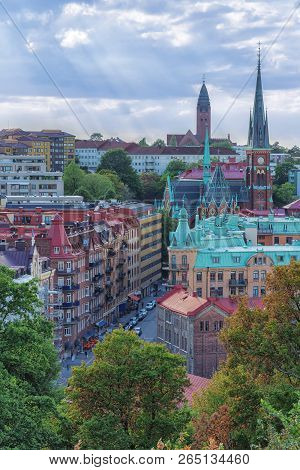 Picture Of European City Overview From The Top With Blue Sky And Clouds.