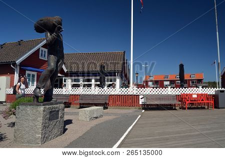 Sculpture of sailor. Marina of the Norwegian fishing town Hvaler . June 19,2018. Hvaler,Norway