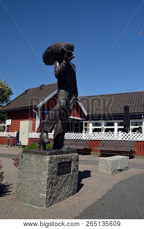 Sculpture of sailor. Marina of the Norwegian fishing town Hvaler . June 19,2018. Hvaler,Norway