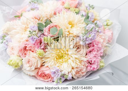 Beautiful Spring Bouquet In Glass Vase. Arrangement With Various Flowers. The Concept Of A Flower Sh