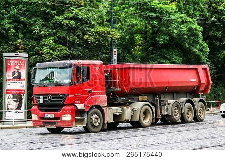 Prague, Czech Republic - July 21, 2014: Red Dump Truck Mercedes-benz Axor 1843 In The City Street.