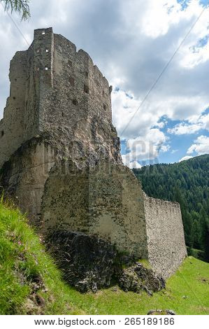Remains Of The Olld Ruined Castle Andraz In The Italian Dolomite Mountains. Summer Afternoon Of 2018