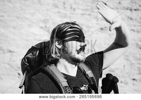 Hipster man traveling with backpack