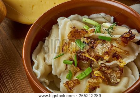 Koldunai, Meat Dumplings, Lithuanian  Cuisine, Baltic Traditional Assorted Dishes, Top View.