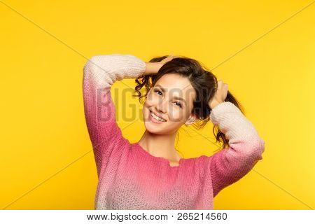 Happy Joyful Smiling Girl Making Pig Tails From Her Hair. Relaxed Carefree Teenage Lifestyle And Chi