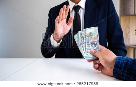Anti Bribery And Corruption Concepts, Businessman Refusing Money Offered By His Partner