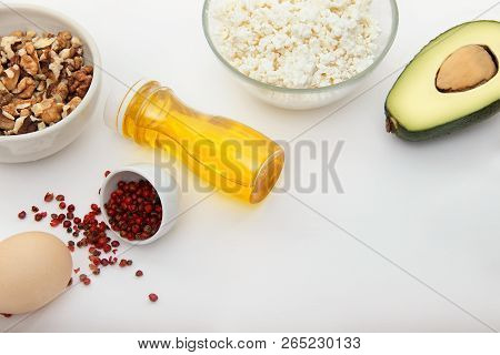 Keto Dieting. Ketogenic Foods On White Background With Copy Space. Low Carb, High Good Fat. Concept