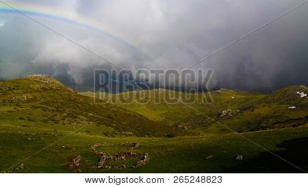 Landscape Of Mavrovo National Park With Rainbow, Mountain And Lake In Fyr Macedonia