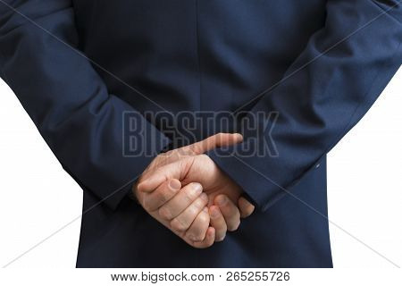 Businessman Standing With Folded Hands Behind The Back