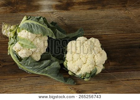 Freshly Carnations On Wooden Background. Organig Food