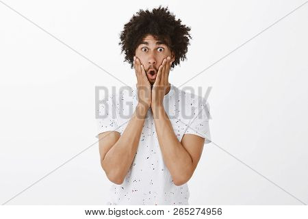 Omg, What Happened. Emotive Stunned Good-looking Mature Hispanic Model With Moustache And Afro Hairs