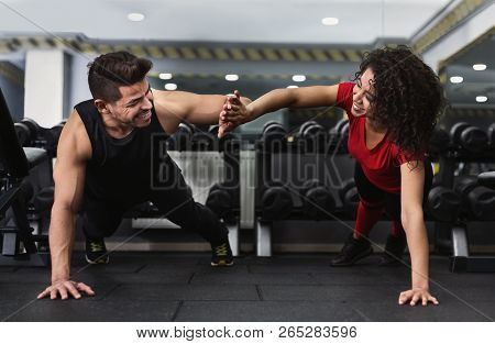 Couple Training At Gym, High Five During Pushups