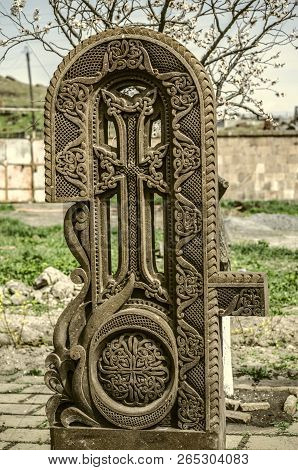 Oshakan,armenia,19 Februar,2018: Stone Cross Carved With Ornaments In The Form Of The Fourth Letter 