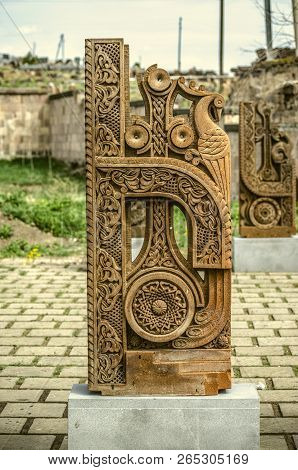 Oshakan,armenia,19 Februar,2018: Stone Cross Carved With Ornaments In The Form Of The Eleventh Lette
