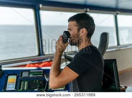 Marine Navigational Officer Is Reporting By Vhf Radio
