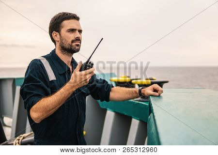 Marine Deck Officer Or Chief Mate On Deck Of Vessel Or Ship