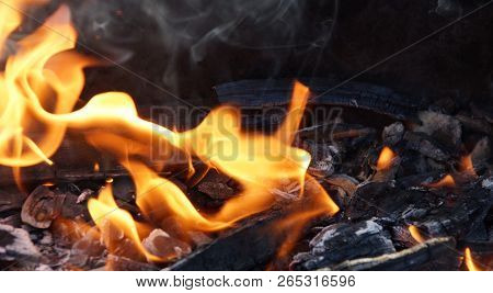 Fire Flame Smoke Embers To Fry On The Street Close-up