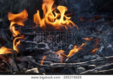 Fire Flame Smoke Embers To Fry On The Street Close-up