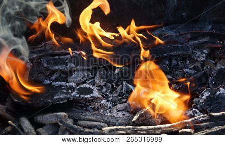 Fire Flame Smoke Embers To Fry On The Street Close-up