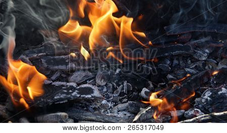 Fire Flame Smoke Embers To Fry On The Street Close-up