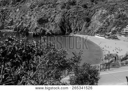 Houcima Beach And Waves And Rocks