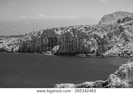 Houcima Beach And Waves And Rocks