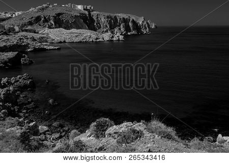 Houcima Beach And Waves And Rocks