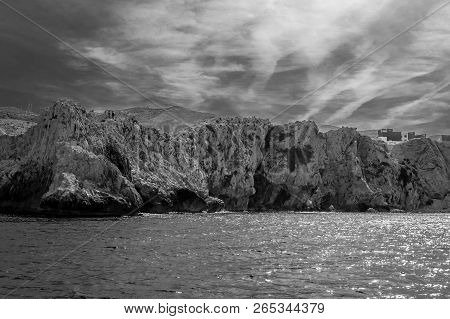 Houcima Beach And Waves And Rocks