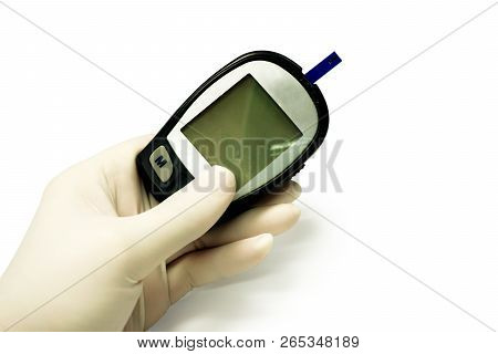 Hand Of Doctor In White Medical Glove Holding Glucose Meter With Sheet Check Isolate On White Backgr