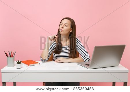 Concerned Woman Holding Pencil Near Chin Looking Down Thinking Dreaming Sit Work At White Desk With 