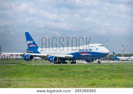 Kyiv Region, Ukraine - August 1, 2018: Silkway Boeing 747-800 Taxiing To The Runway For Takeoff