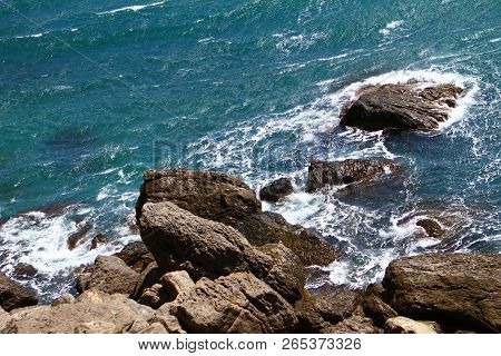 Wonderful Petrous Bright Blue Sea Beach With Big Stones On A Summer Day, Natural Landscape Photo