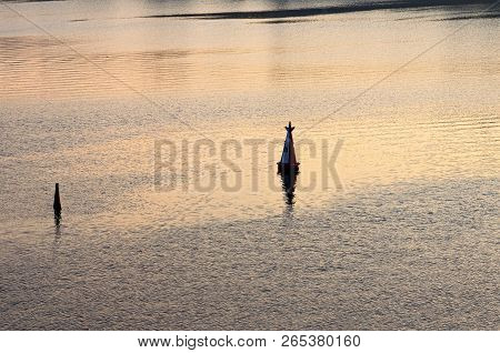 Buoy Marking The Navigable Depth. Floating Beacon, Buoy On The Water. Navigation. River Dnipro (dnie