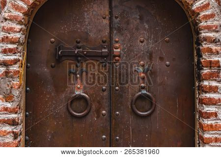 Old Rusty Gate Of The Ancient Monastery In Georgia, Tbilisi