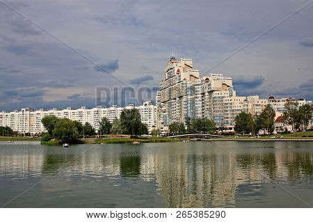 Minsk, Belarus - August 13, 2018:  High Rise Apartment House On Svislach River Embankment Near Trini