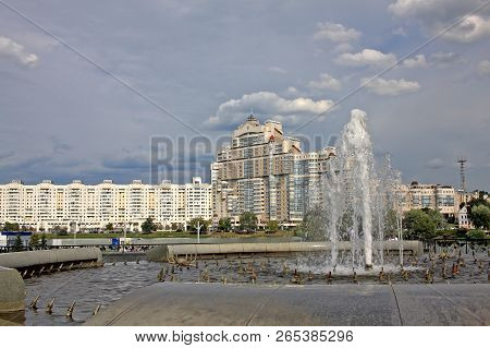Minsk, Belarus - August 13, 2018:  High Rise Apartment House On Svislach River Embankment Near Trini