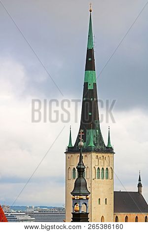 The Spire Of The Church Of Oleviste (st. Olaf) Close Up On A Cloudy Day, Tallinn, Estonia