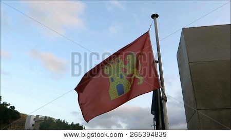 Alora, Spain - August 21, 2018: Local Flag Of Village Of Alora Municipality Blowing In Early Morning